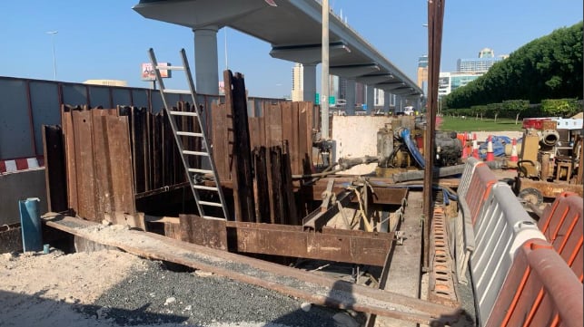 View of open construction pit at side of Sheikh Zayed highway