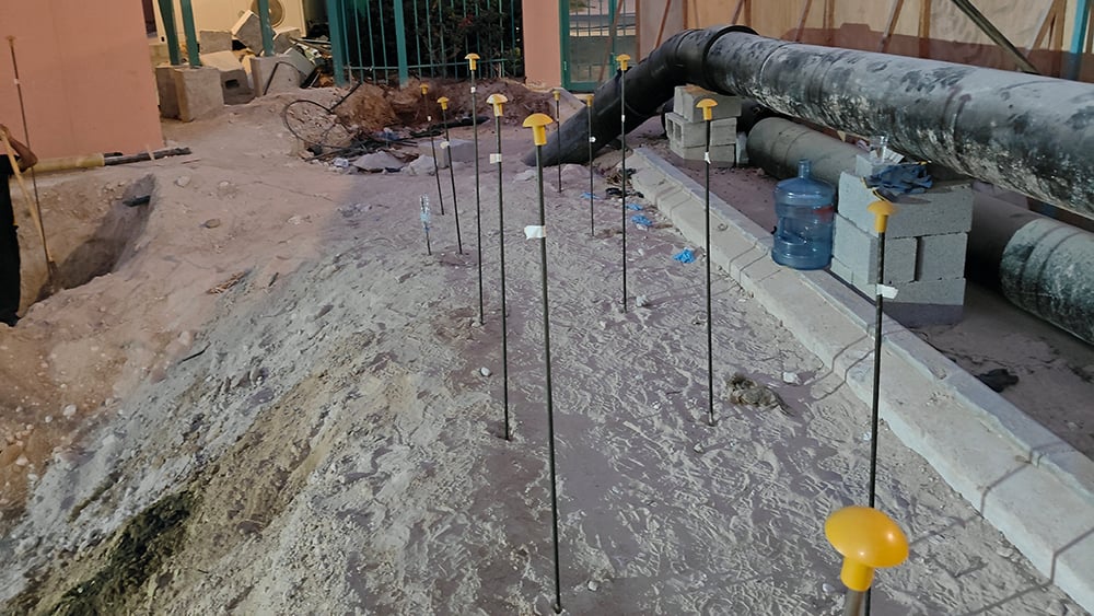 Geobear injection tubes installed in sandy soil in built environment