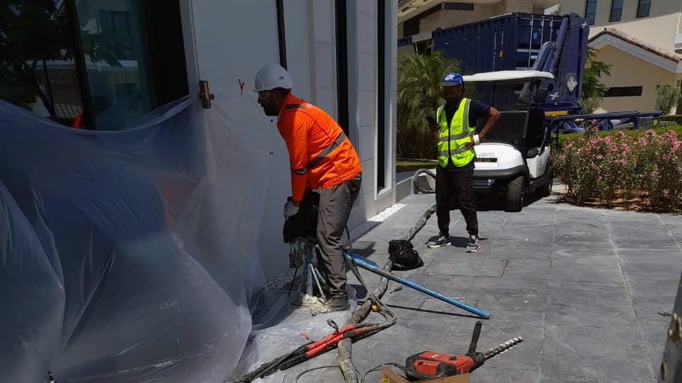 Geobear techs treating a private villa, external injections