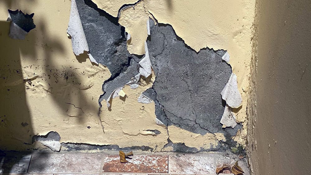 Close up view of external crack in villa home caused by ground settlement