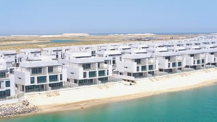 Aerial view of UAE villas on the beach