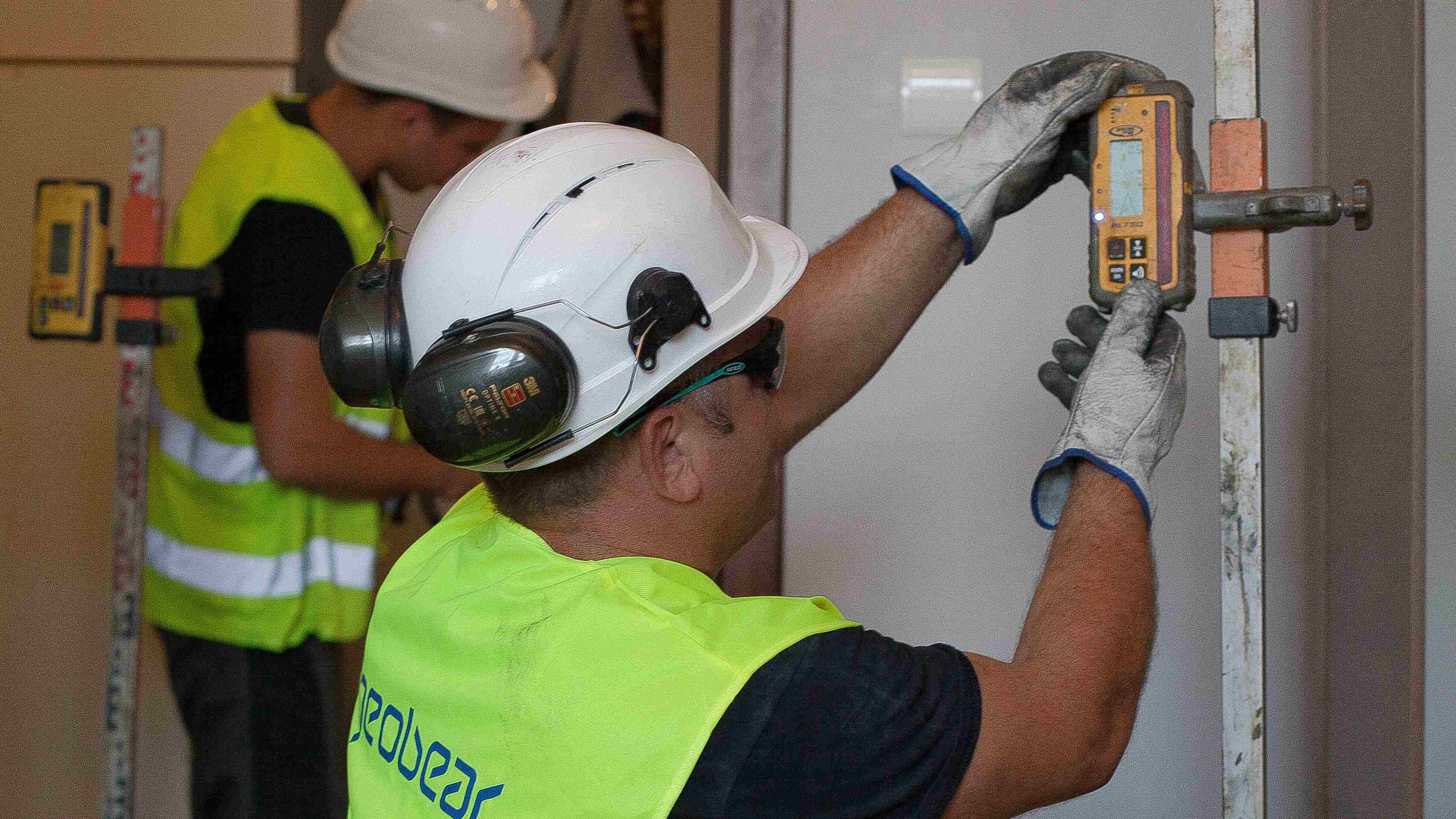 Technicians use laser monitoring