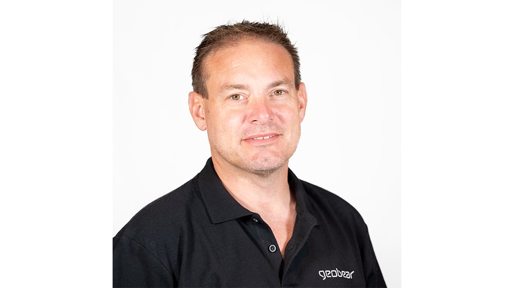 Headshot of Simon Hughes