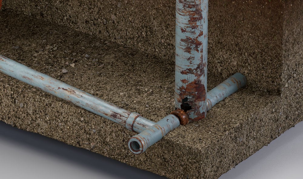 Läckande rör i mark som orsakat sättningar.