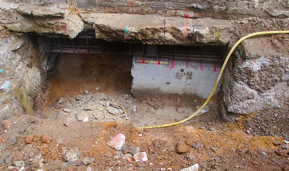 Balk- och plattgrundsförstärkning, Massivbetongförstärkning