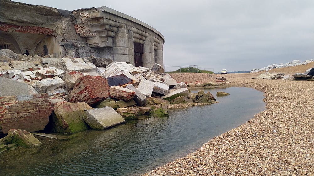 Collapsed rubble of portion of Hurst Castle which has fallen into the shallow sea pools