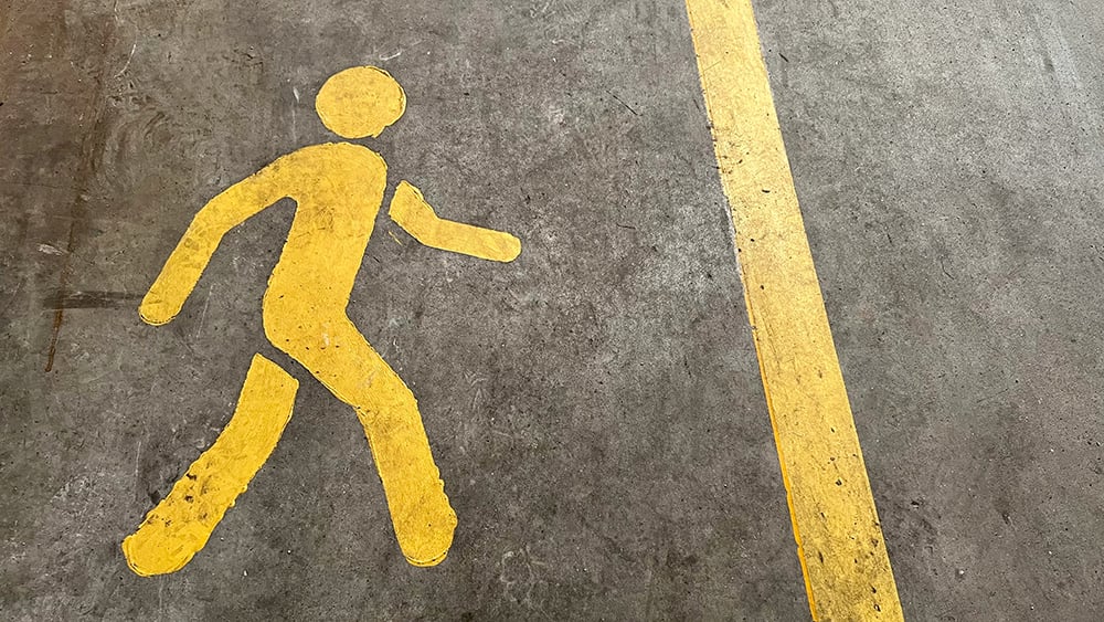 safety drawing on warehouse floor indicating where people walk