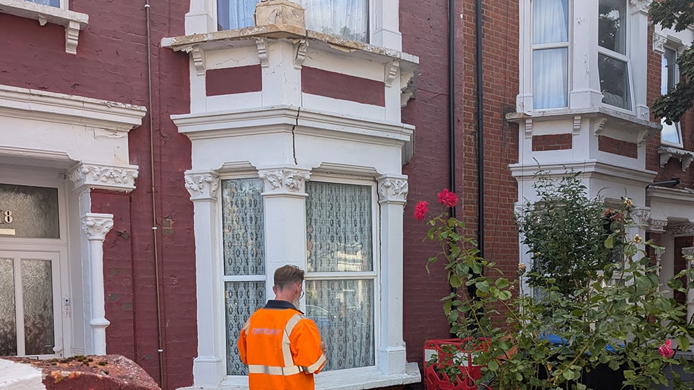 Terrace home with subsidence crack