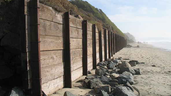 View of sea wall along beach