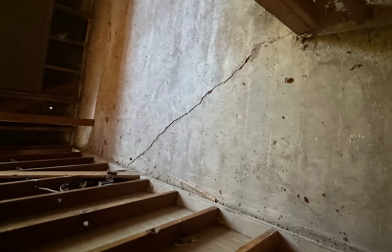 cracking basement floors due to drainage issues