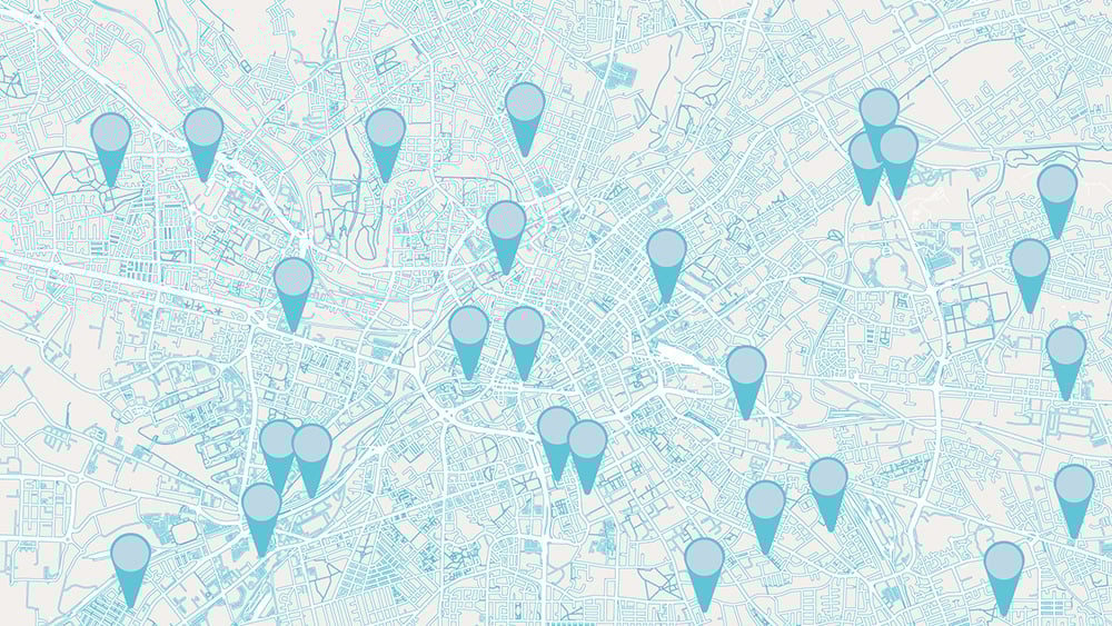 2D city map illustration with location icons distributed across the map